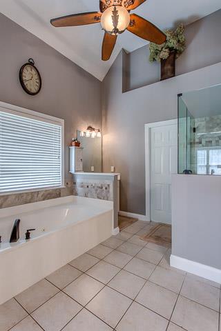 232 Chester Stevens Road Franklin, TN 37067 - Photo 12 of 20 EXTENDED CEILING, TILED FLOORING, WINDOW LIGHTING, CEILING FAN UPGRADE, SOAKING TUB, BIG SHOWER, ORNAMENTAL SHELVING, AND ONE OF TWO VANITIES....