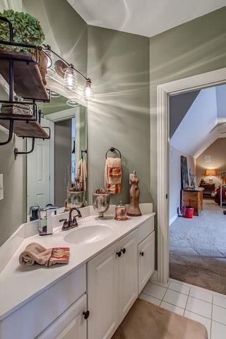 232 Chester Stevens Road Franklin, TN 37067 - Photo 15 of 20 THE MIDDLE CONNECTION IS MADE VIA THIS EXCELLENT SPACE FEATURING AN ENCLOSED BATH AND TOILET. NOTICE THE UPDATED LIGHTING THAT REALLY ADDS A GREAT LOOK TO THIS SPACE...
