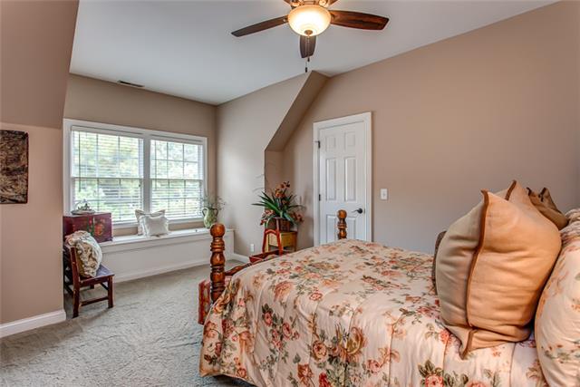 232 Chester Stevens Road Franklin, TN 37067 - Photo 16 of 20 THE OTHER BEDROOM UP IS LARGE AS WELL WITH DOUBLE WINDOWS OVER ITS OWN WINDOW SEAT. THERE'S A WALK-IN CLOSET HERE AS WELL AND ANOTHER OVERHEAD CEILING FAN!