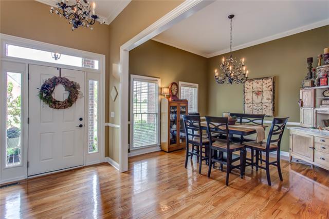 232 Chester Stevens Road Franklin, TN 37067 - Photo 3 of 20 INSIDE THE GLEAMING FLOORS CAN'T BE MISSED AS WELL AS THE UPDATED LIGHTING & SPACIOUSNESS OF EACH OF THE LIVING SPACES! THIS SHOWS A GLIMPSE OF THE FORMAL DINING ROOM...