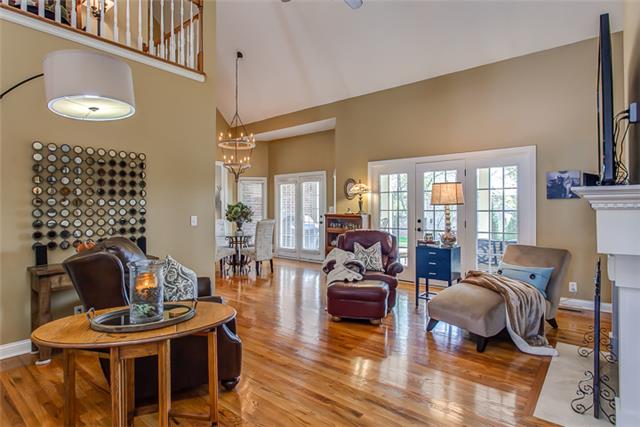 232 Chester Stevens Road Franklin, TN 37067 - Photo 5 of 20 THE GREAT ROOM FEATURES A FULL WALL OF WINDOWS TO THE REAR CONCRETE OUTER DECK & YARD! THIS VIEW SHOWS THE 2-STORY ROOM VIEW TOWARDS THE CASUAL DINING AREA OFF THE KITCHEN, BETWEEN THE GREAT ROOM & THE DEN...
