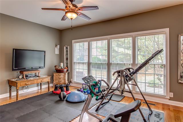 232 Chester Stevens Road Franklin, TN 37067 - Photo 9 of 20 NEED A PLACE TO CALL A DEN, GATHERING OR MORNING ROOM OR CHILDREN'S PLAY AREA? THIS ROOM IS CURRENTLY USED FOR WORKOUT ENTHUSIASTS WHO LOVE SEEING THE OUTDOORS INSIDE THROUGH THE FULL BANK OF WINDOWS!