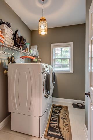 232 Chester Stevens Road Franklin, TN 37067 - Photo 10 of 20 ...AND THEN, OF COURSE, THIS AMPLE LAUNDRY ROOM SPACE THAT HOUSES A CLOSET FOR STORAGE, AMENDED BY AN OVERSIZED PANTRY. THIS HOME IS GREAT FOR THE USE OF EVERY POSSIBLE SPACE! NOTE THE ELEGANT PENDANT OVERHEAD!!!