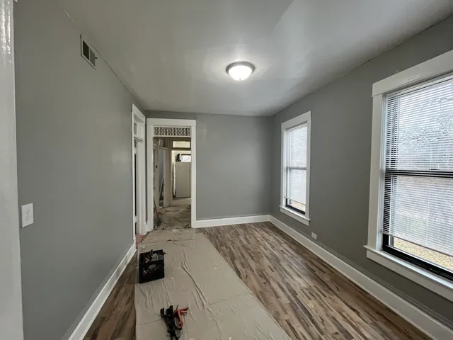 a view of hallway with natural light