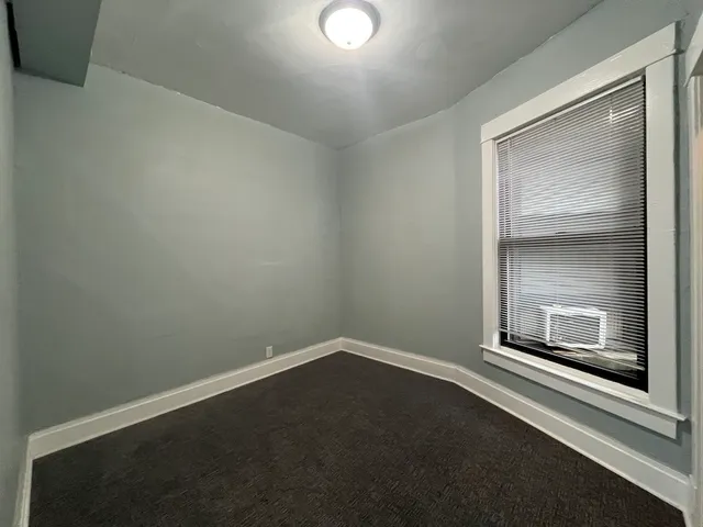 en empty room with windows