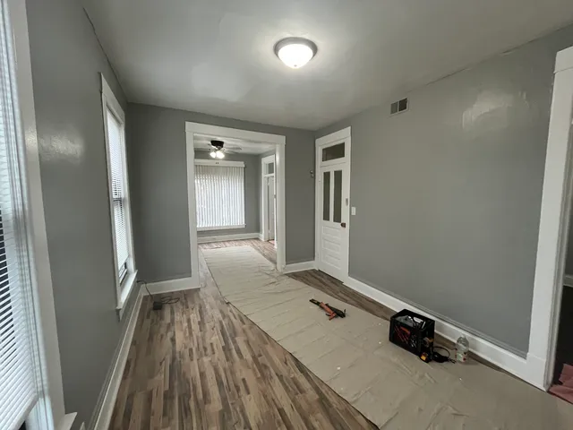 wooden floor and windows in a room