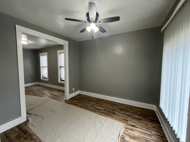 a view of a hallway with a chandelier