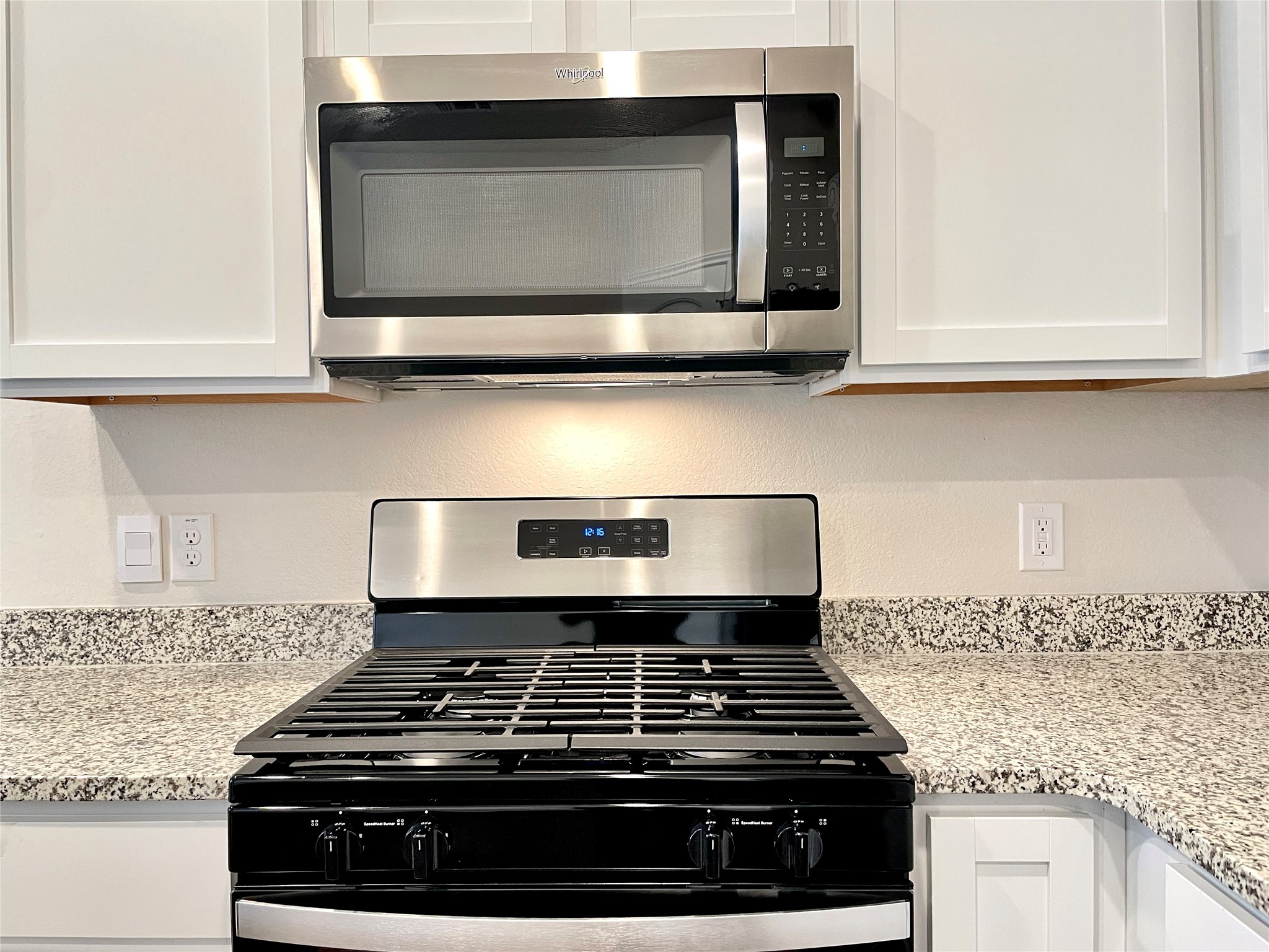 467 Evergreen Sumac Loop Kyle, TX 78640 - Photo 13 of 40 a stove top oven sitting inside of a kitchen