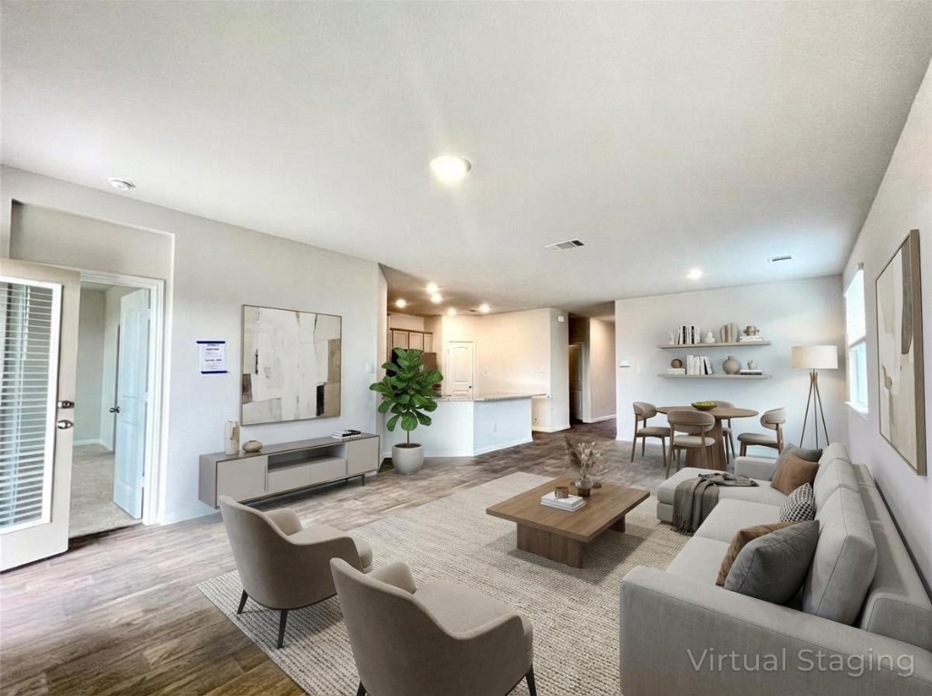 467 Evergreen Sumac Loop Kyle, TX 78640 - Photo 15 of 40 Living room featuring wood finished floors and recessed lighting