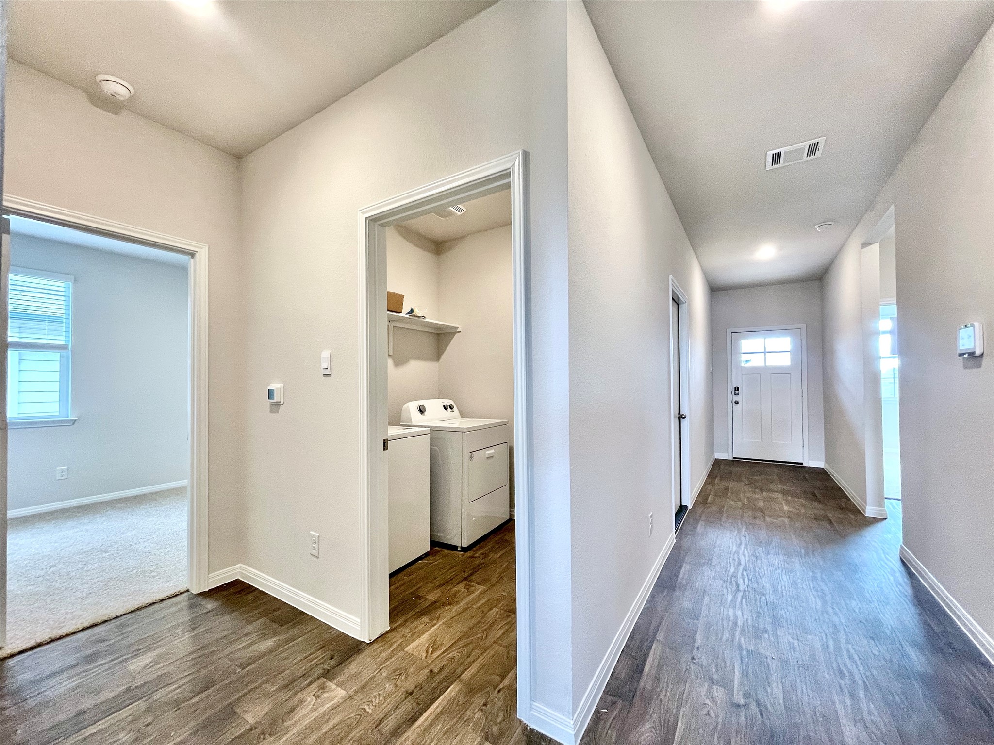 467 Evergreen Sumac Loop Kyle, TX 78640 - Photo 21 of 40 wooden floor in a gallery