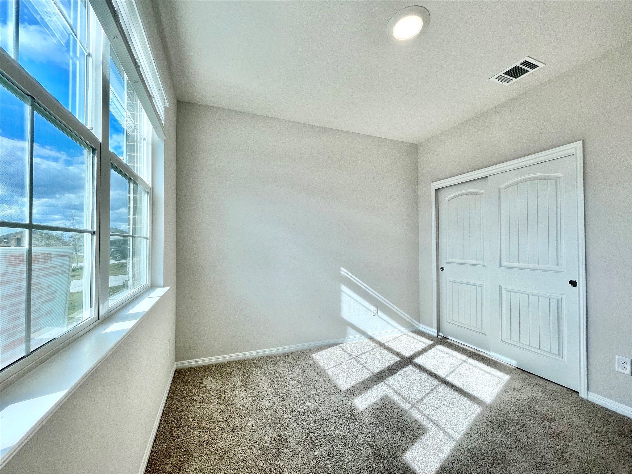 467 Evergreen Sumac Loop Kyle, TX 78640 - Photo 33 of 40 a view of an empty room and window