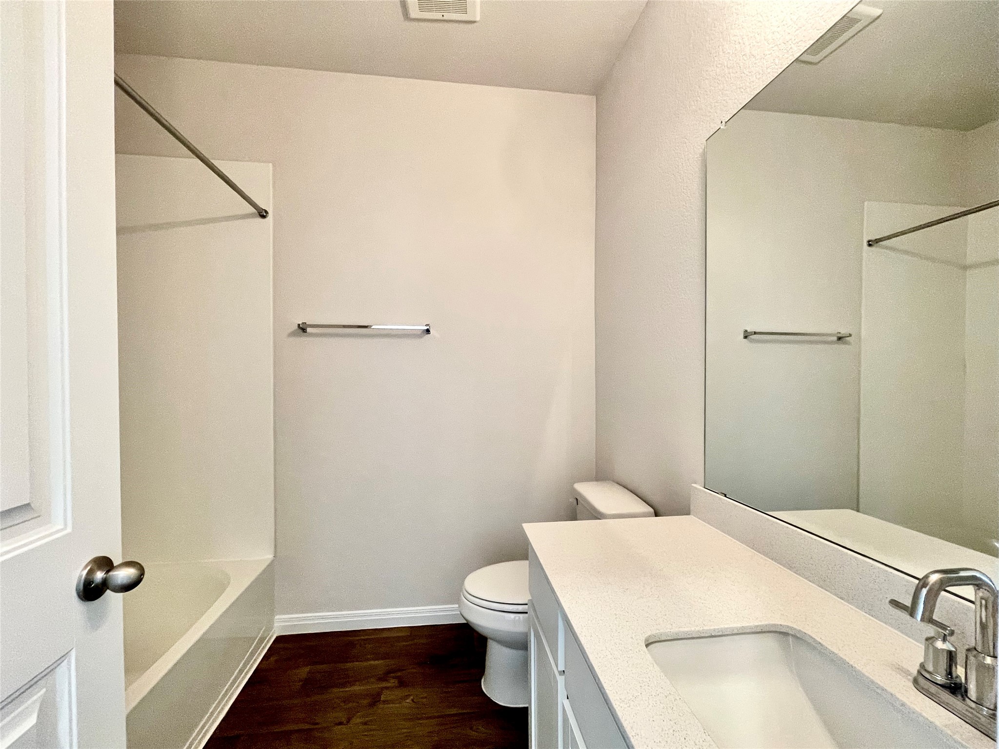 467 Evergreen Sumac Loop Kyle, TX 78640 - Photo 36 of 40 a bathroom with a sink toilet and vanity