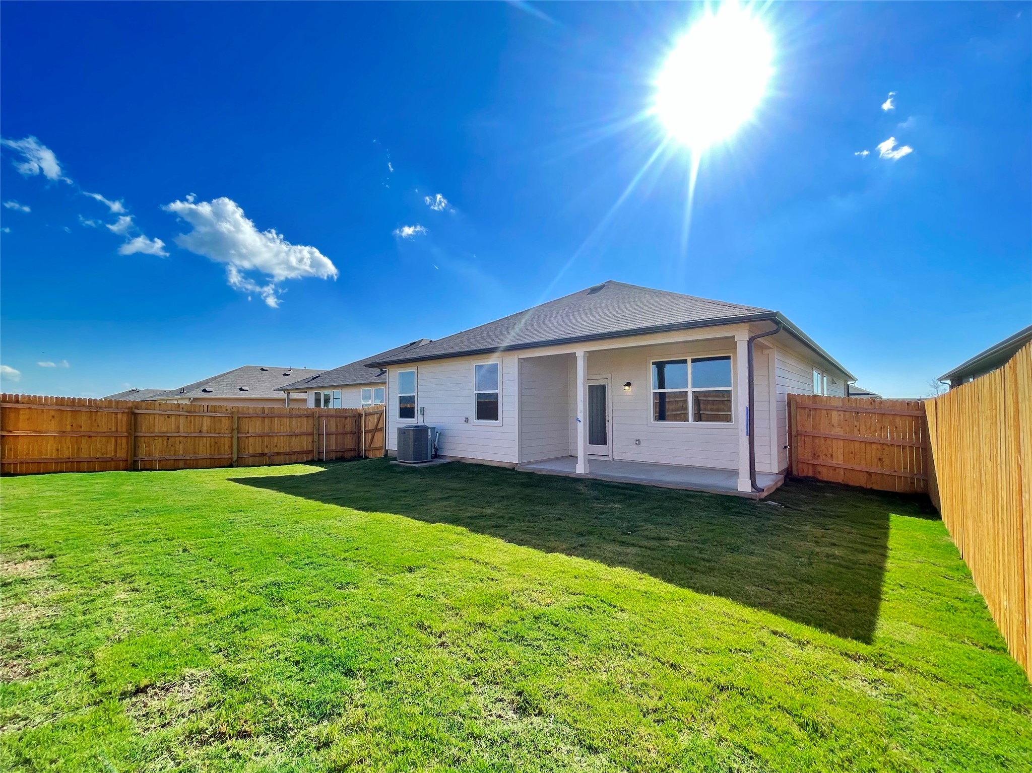 467 Evergreen Sumac Loop Kyle, TX 78640 - Photo 39 of 40 a front view of a house with garden
