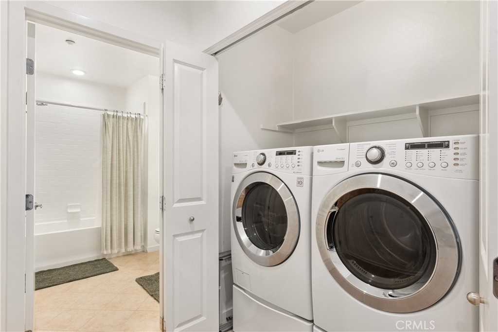 21 Gramercy, Unit 102 Irvine, CA 92612 - Photo 13 of 30 Dedicated laundry area with full size washer and dryer for added convenience.