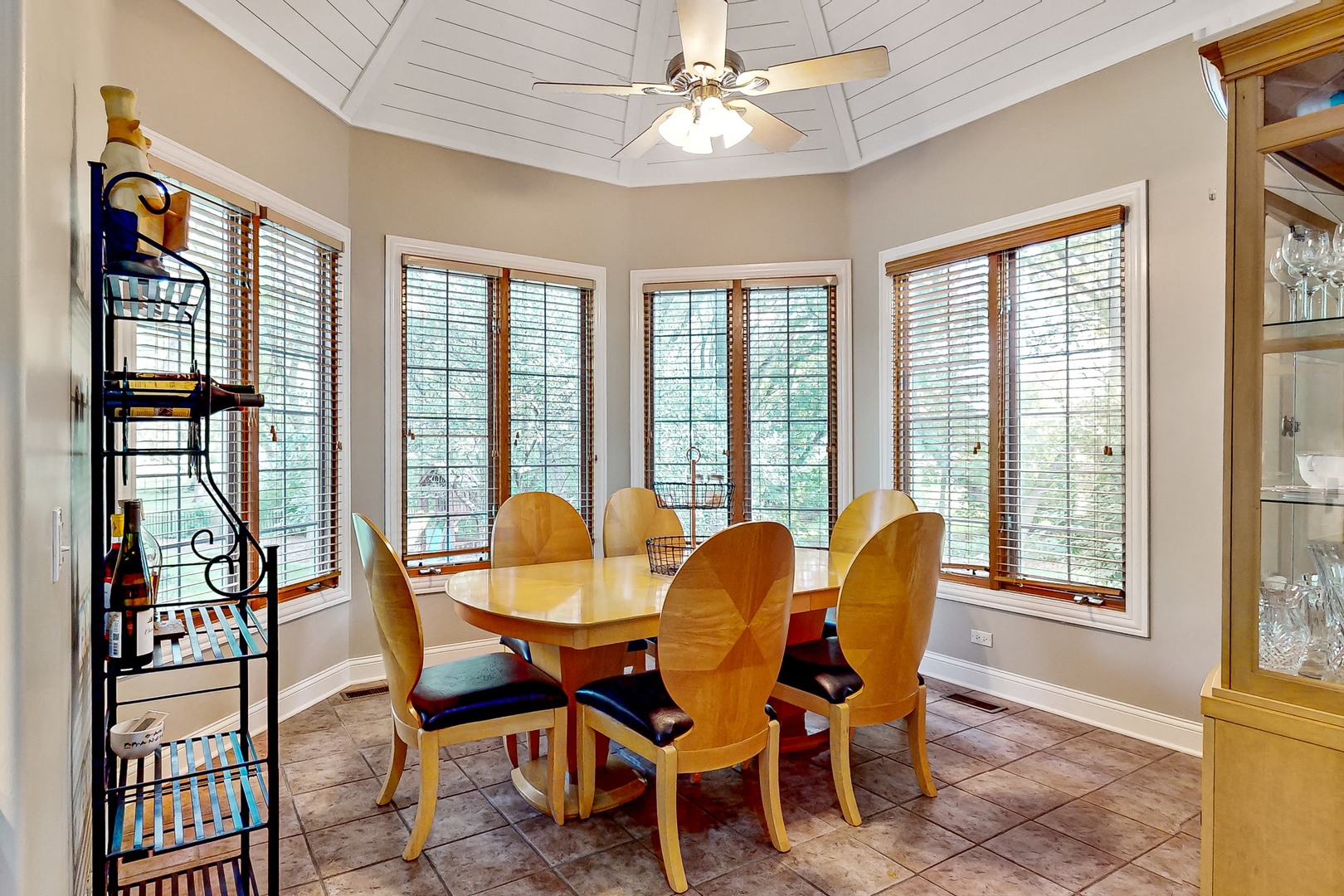 35W998 Miller Road Dundee, IL 60102 - Photo 12 of 33 a dining room with furniture a chandelier and a rug