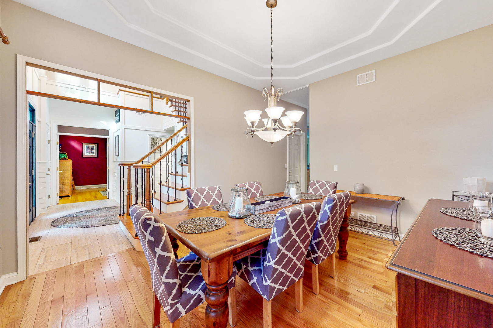 35W998 Miller Road Dundee, IL 60102 - Photo 13 of 33 a dining room with furniture a chandelier and wooden floor