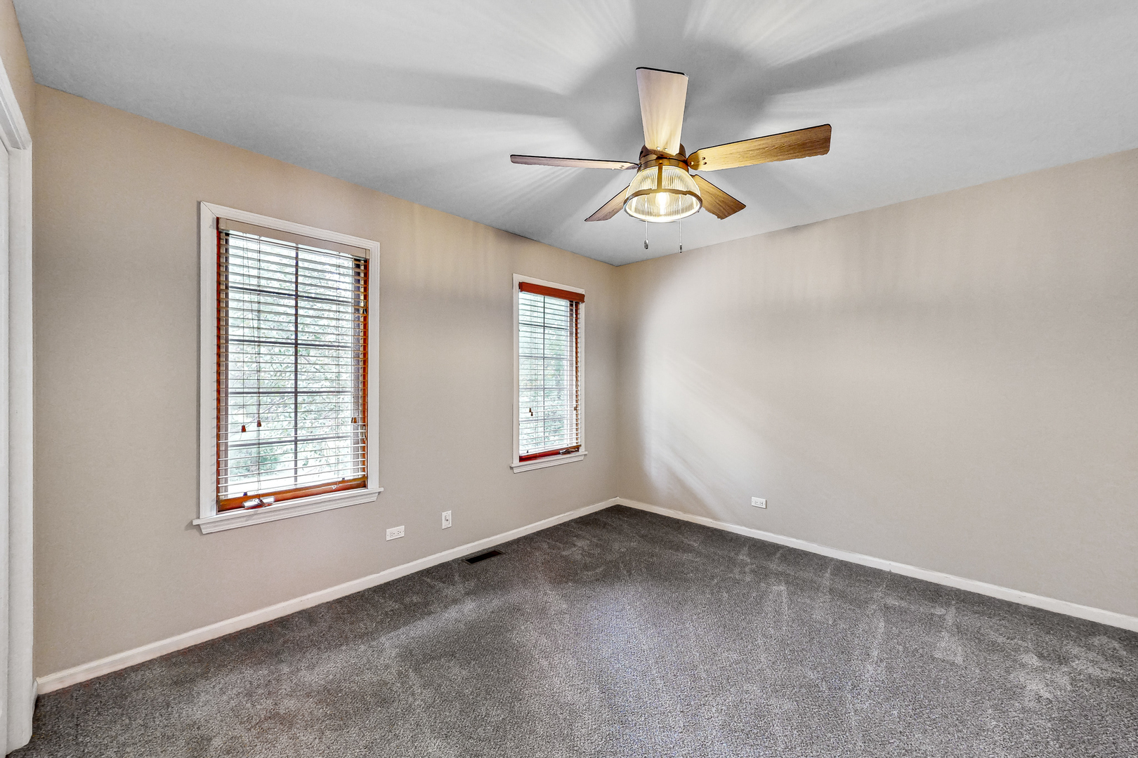 35W998 Miller Road Dundee, IL 60102 - Photo 25 of 33 an empty room with windows and fan