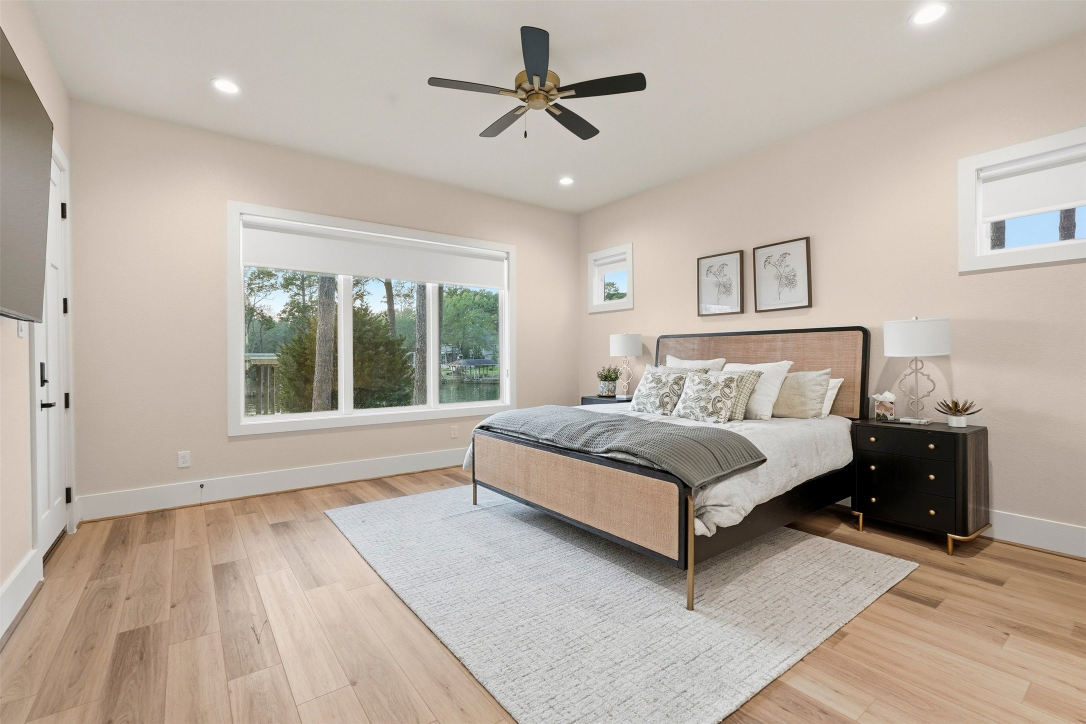 12833 Bruce Road Willis, TX 77318 - Photo 28 of 50 Primary Bedroom on the First Floor with Great Views of Lake Conroe