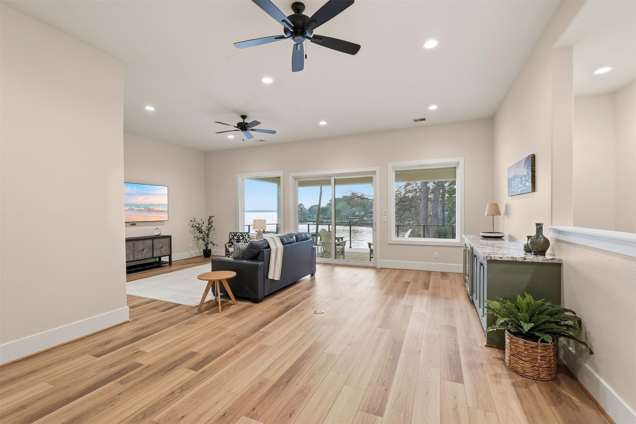 12833 Bruce Road Willis, TX 77318 - Photo 34 of 50 Massive Game Room Leading to Upstairs Balcony with Great Lake Views!