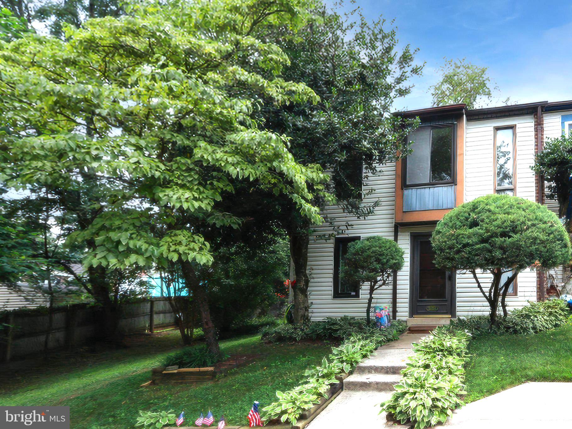 10704 Lester Street Silver Spring, MD 20902 - Photo 1 of 5 Charming home with lush greenery.