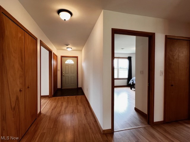 6949 Fee Road Rome, OH 44085 - Photo 7 of 19 Corridor featuring wood-type flooring