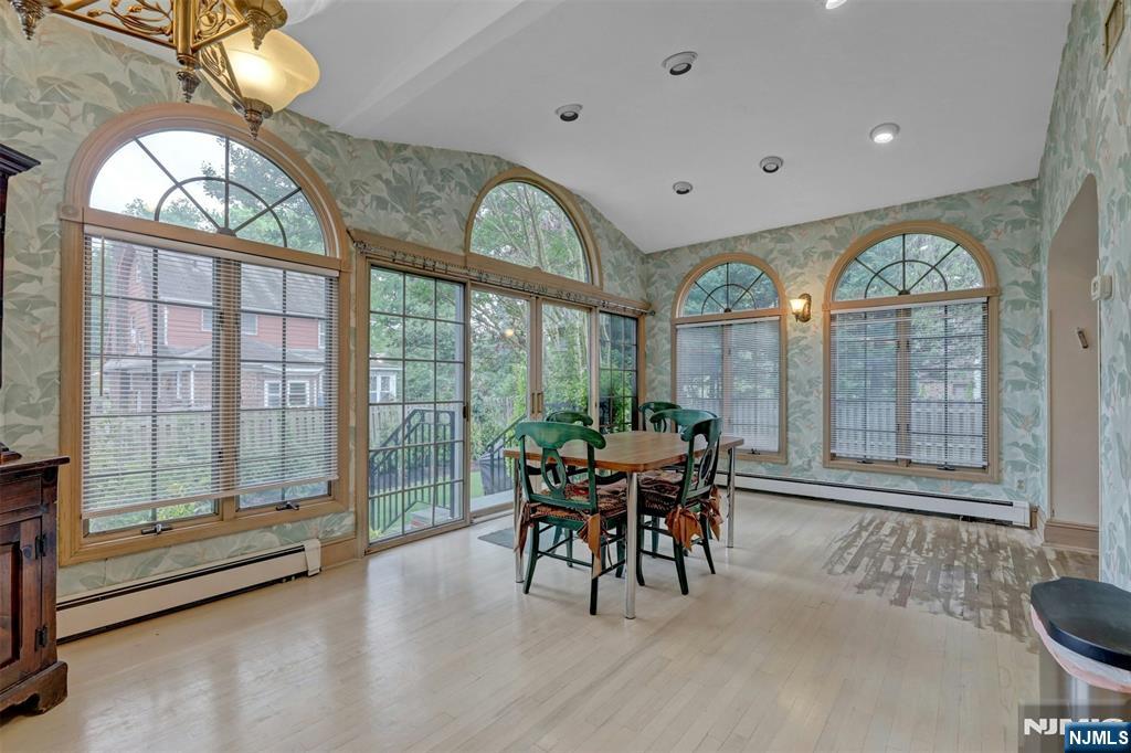 548 Standish Road Teaneck, NJ 07666 - Photo 12 of 28 a view of a dining room with furniture window and outside view