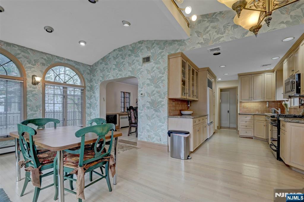 548 Standish Road Teaneck, NJ 07666 - Photo 13 of 28 a view of a dining room with furniture