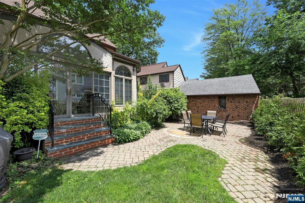 548 Standish Road Teaneck, NJ 07666 - Photo 25 of 28 a view of backyard with outdoor seating and green space