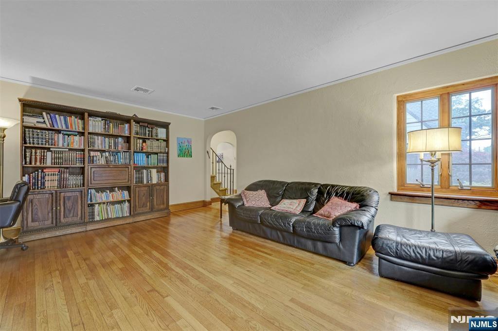 548 Standish Road Teaneck, NJ 07666 - Photo 7 of 28 a living room with furniture and a large window