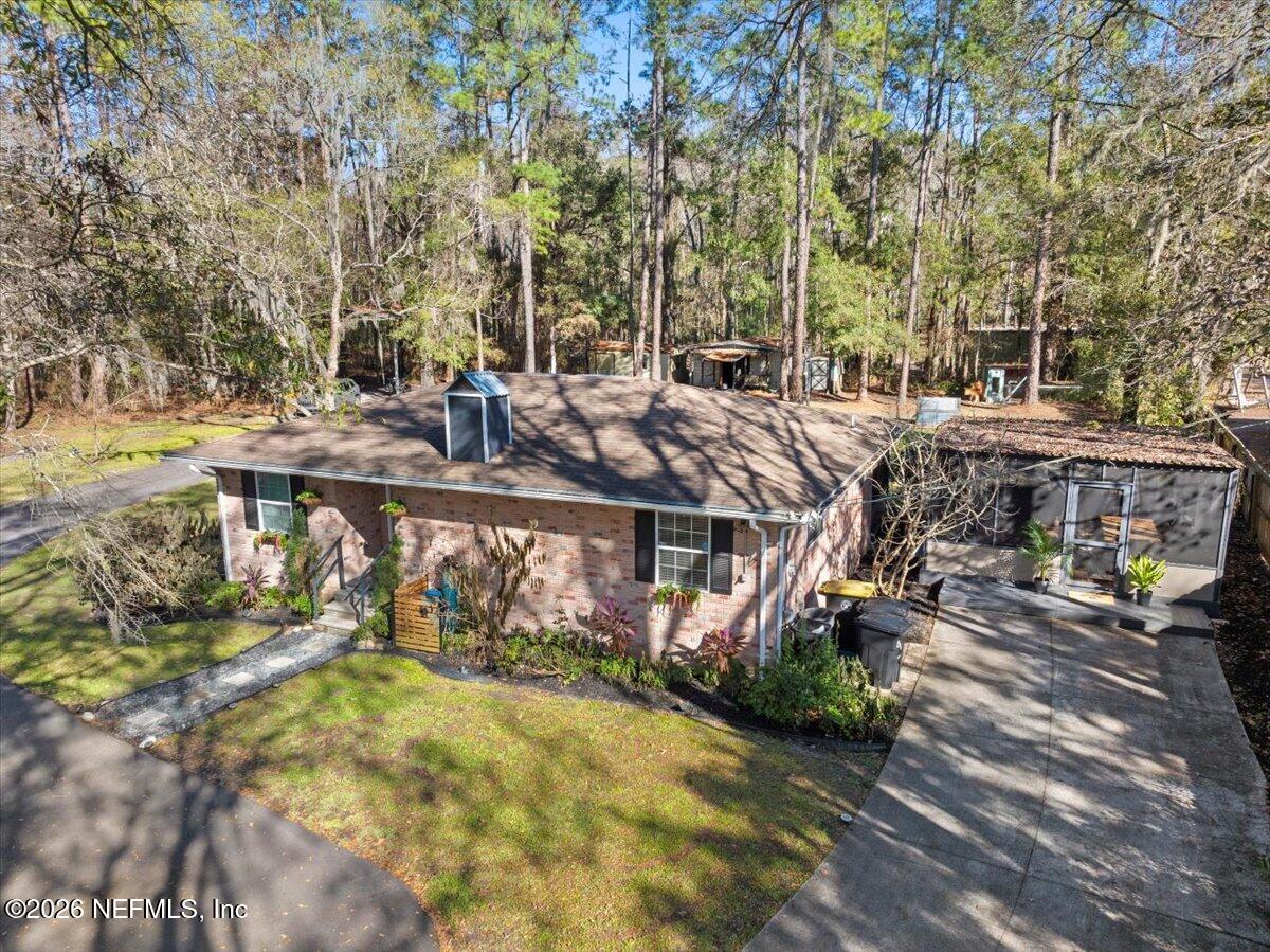 1917 Blair Road Jacksonville, FL 32221 - Photo 1 of 30 a view of a house with a yard and sitting area