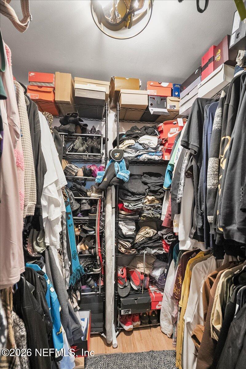 1917 Blair Road Jacksonville, FL 32221 - Photo 13 of 30 a view of walk in closet with clothes and shoes