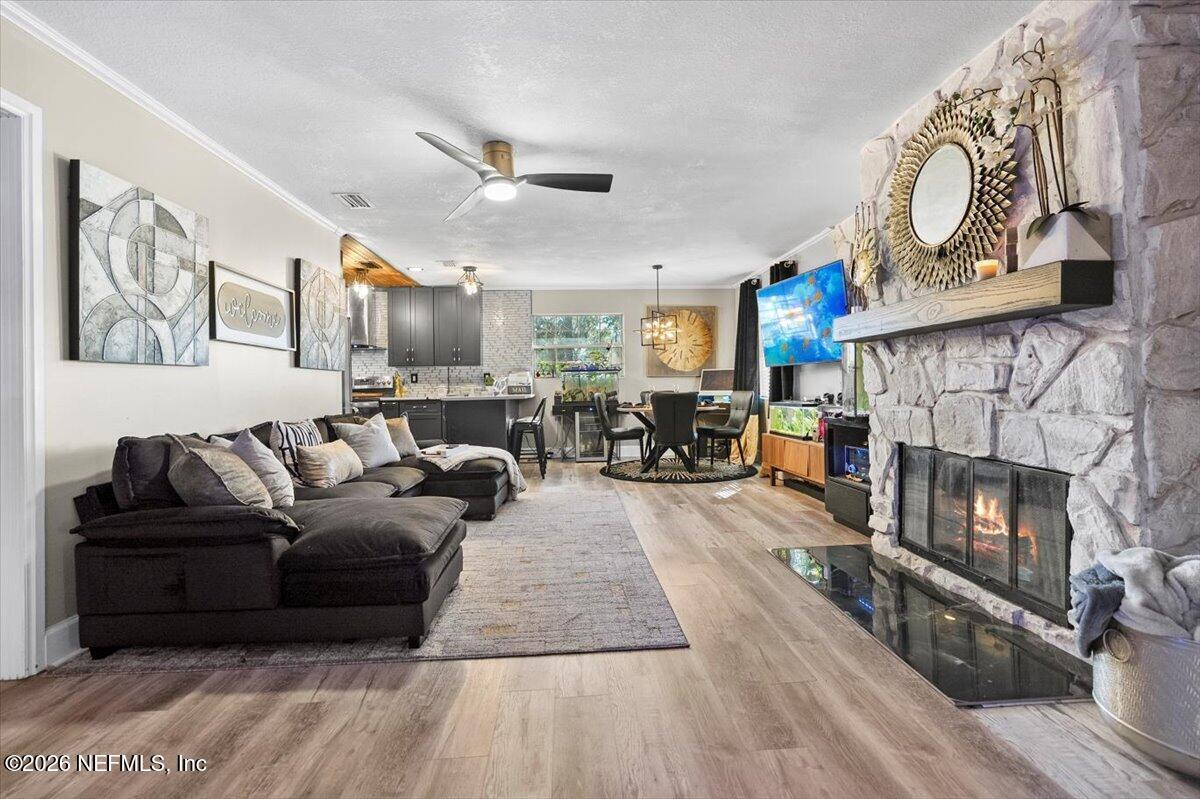 1917 Blair Road Jacksonville, FL 32221 - Photo 5 of 30 a living room with furniture and a fireplace