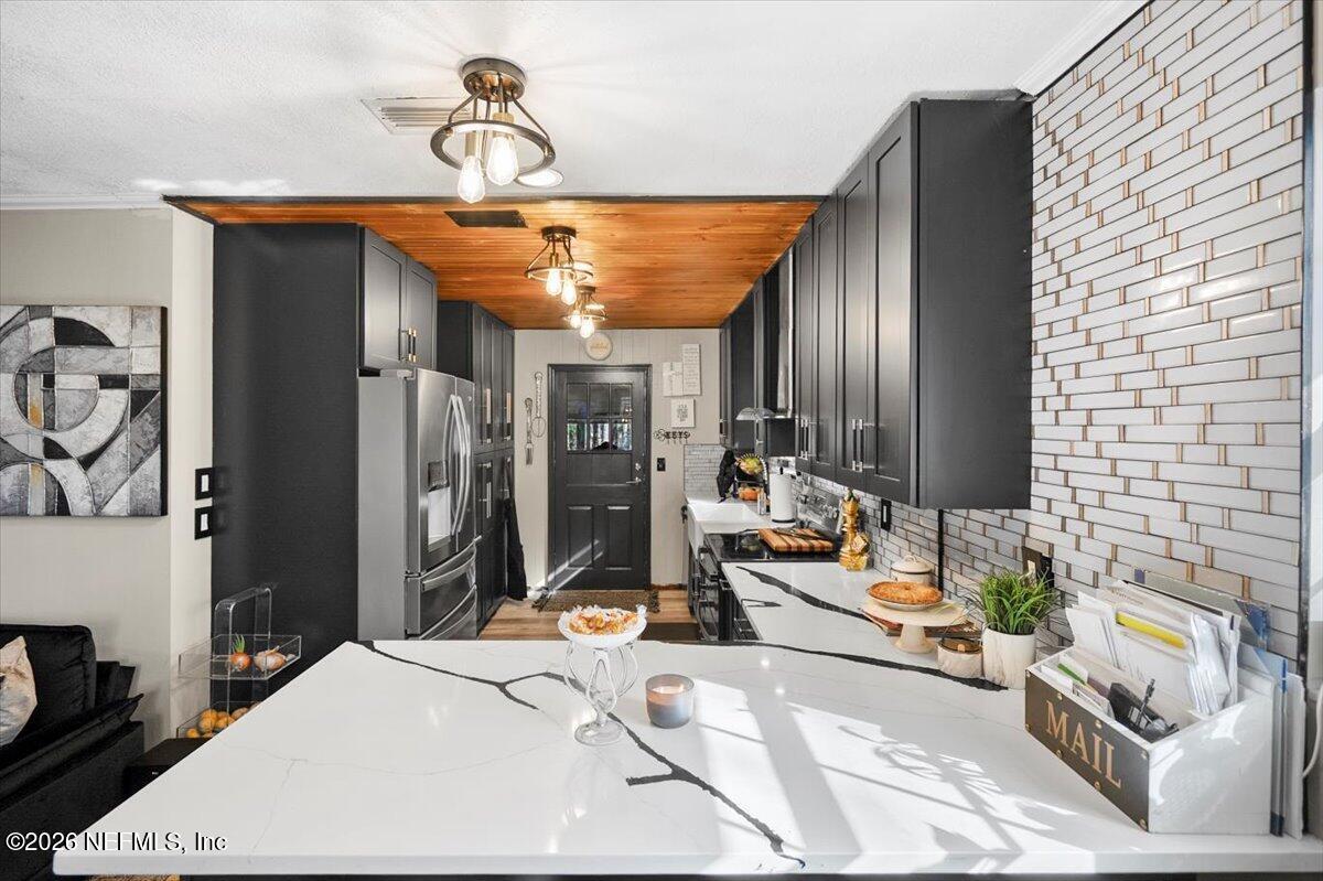 1917 Blair Road Jacksonville, FL 32221 - Photo 7 of 30 a living room with furniture and stainless steel appliances