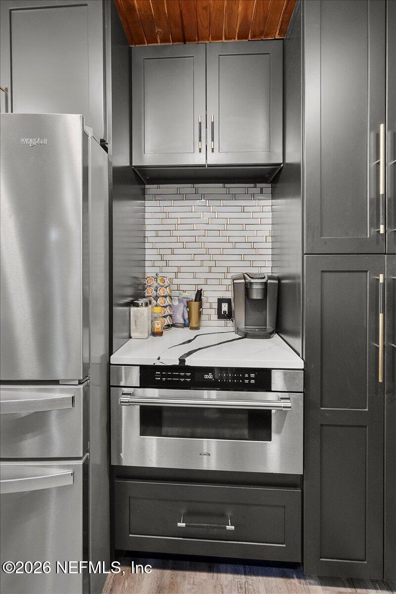1917 Blair Road Jacksonville, FL 32221 - Photo 9 of 30 a stove top oven sitting inside of a kitchen