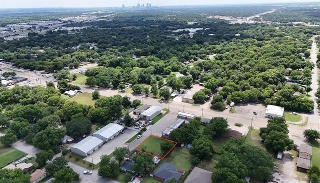 an aerial view of residential house with outdoor space