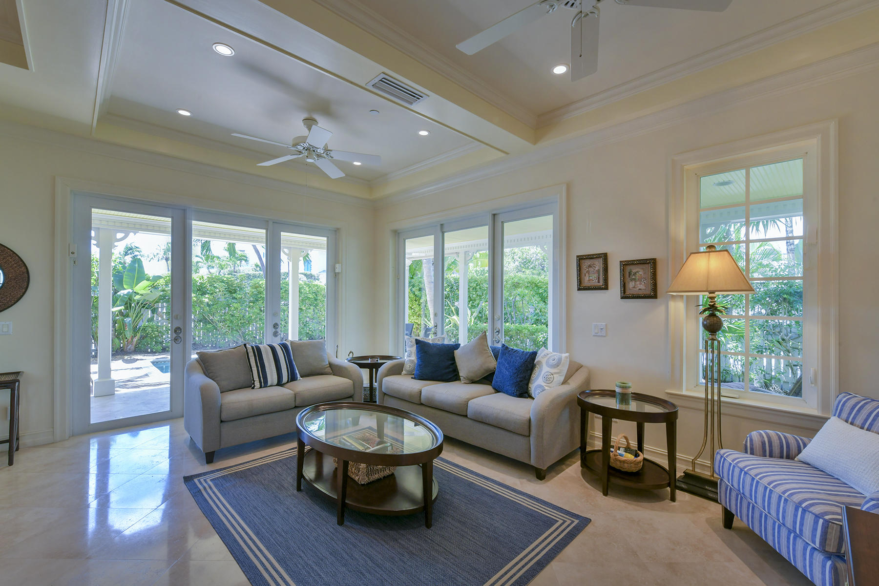 58 Sunset Key Drive Key West, FL 33040 - Photo 11 of 35 a living room with furniture and a large window