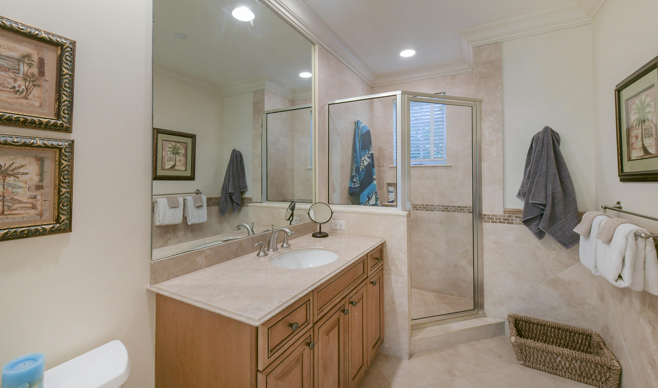 58 Sunset Key Drive Key West, FL 33040 - Photo 21 of 35 a bathroom with a sink a toilet and mirror