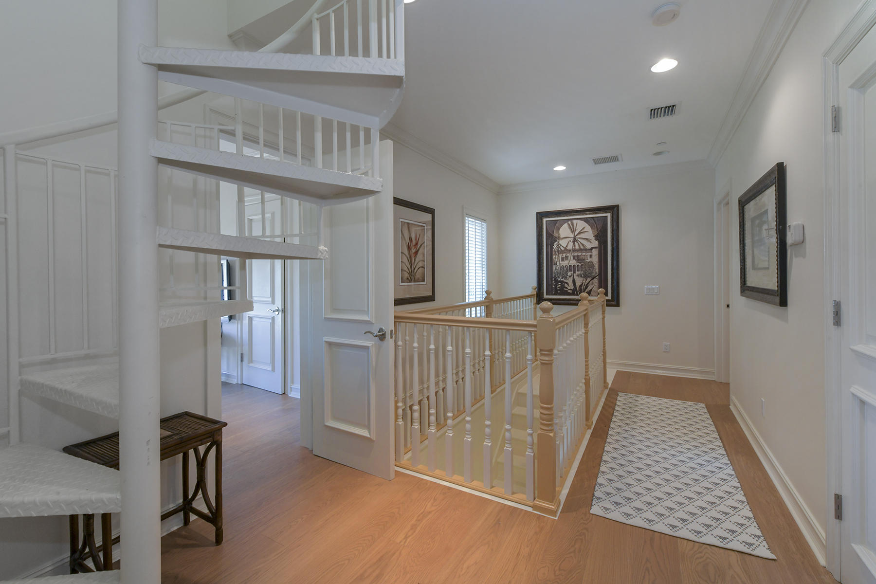58 Sunset Key Drive Key West, FL 33040 - Photo 24 of 35 a view of a hallway to a livingroom with furniture and windows