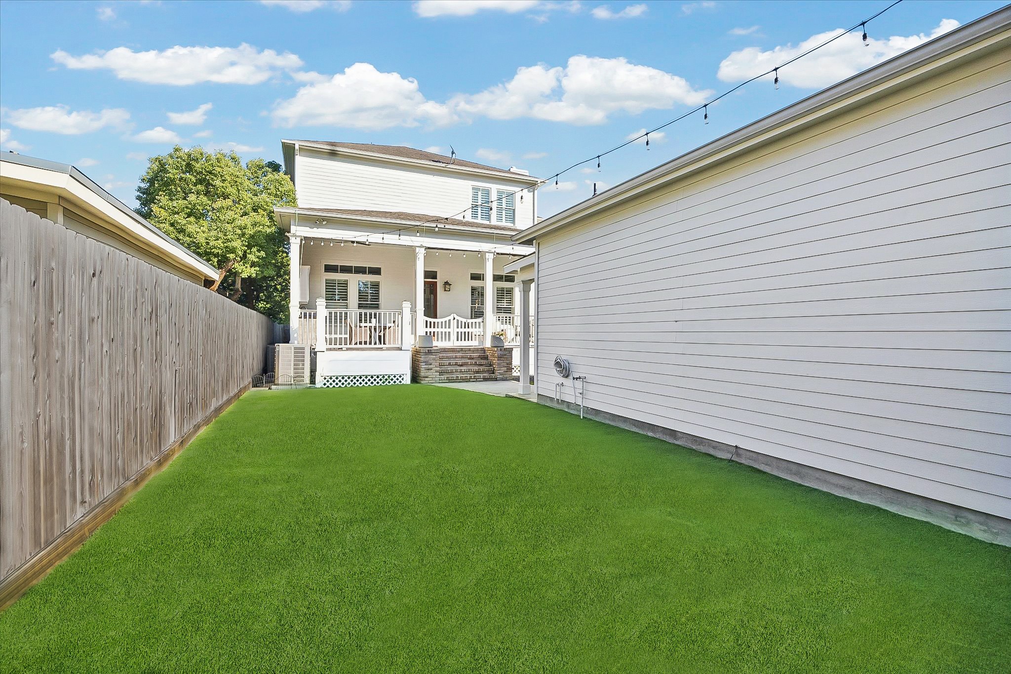 1127 Tulane Street Houston, TX 77008 - Photo 6 of 22 a view of a backyard with plants and a patio