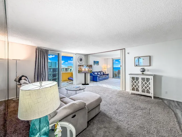 a view of a livingroom with furniture and wooden floor