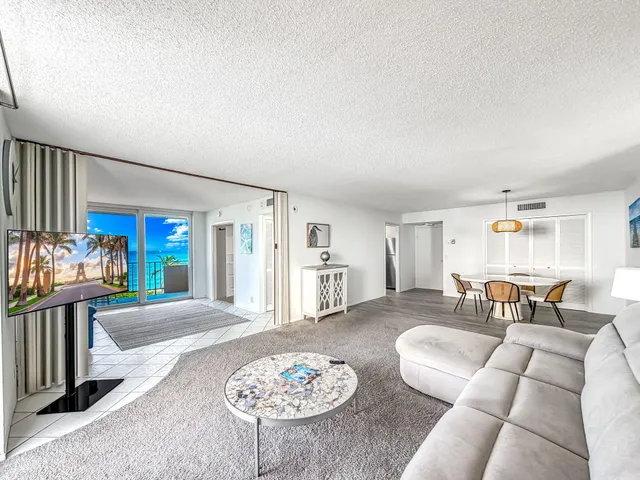 a bathroom with a sink toilet double vanity and shower