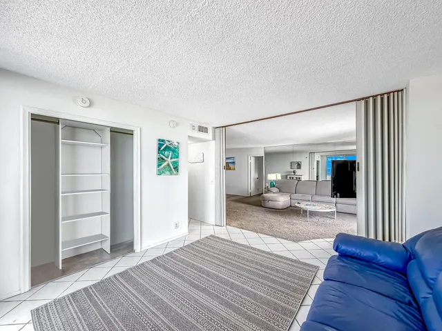 a view of balcony with furniture