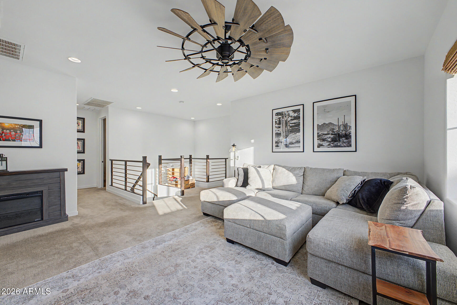 819 West Deer Creek Road Phoenix, AZ 85048 - Photo 46 of 76 a living room with furniture a couch and a chandelier