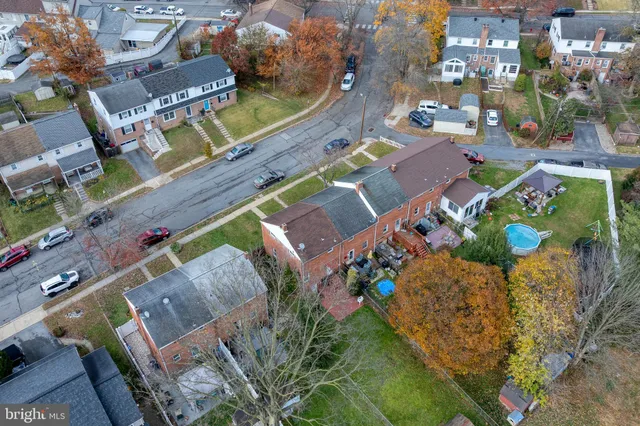 an aerial view of a house with a garden