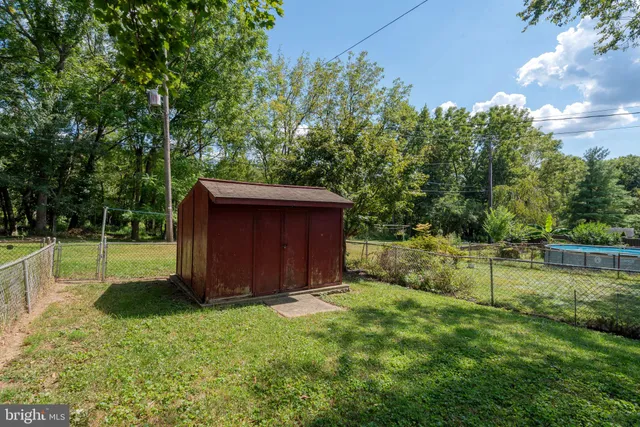 a view of backyard with green space