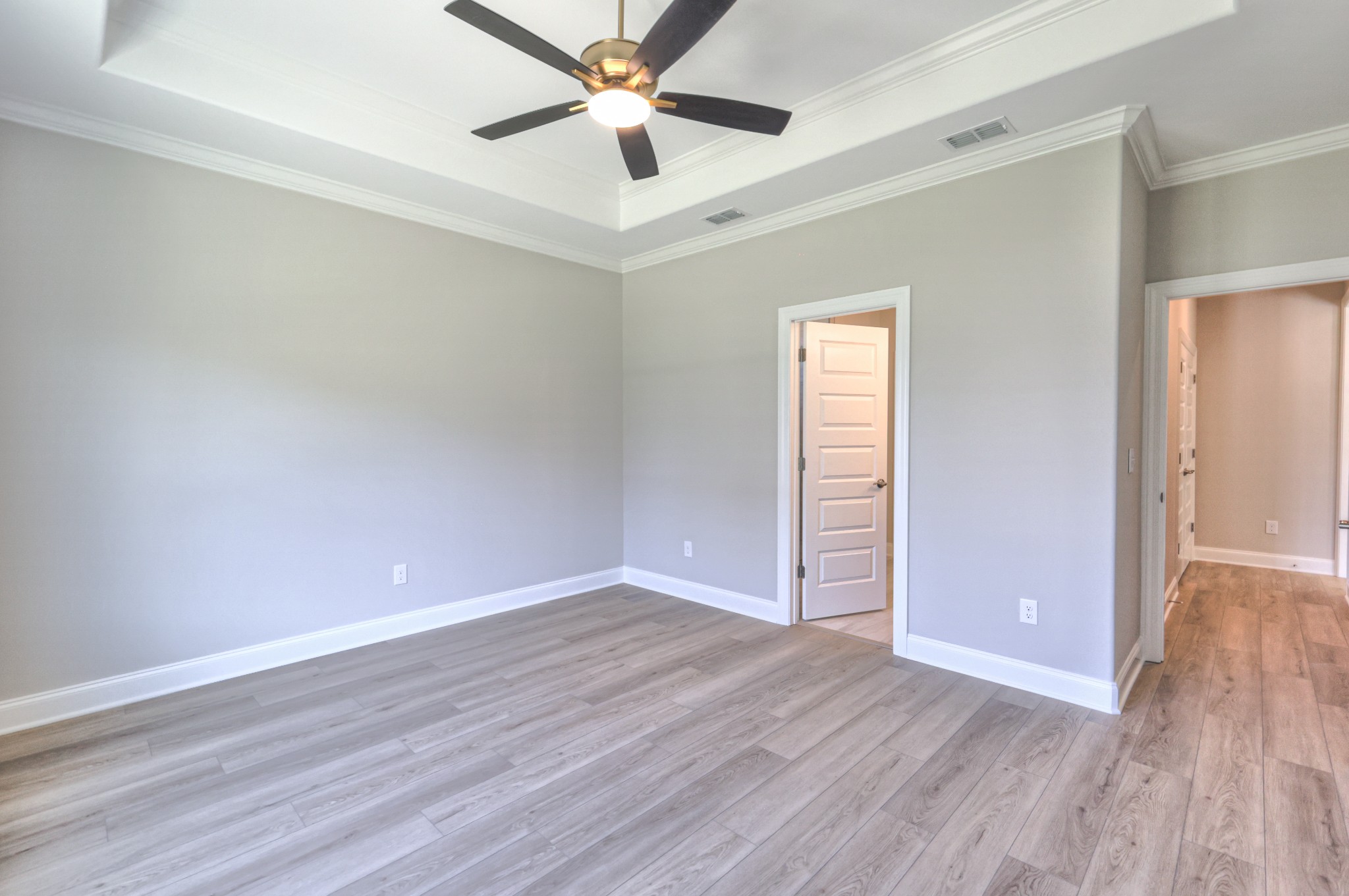 437 Ruby Oaks Lane Murfreesboro, TN 37128 - Photo 19 of 38 wooden floor in an empty room with a window