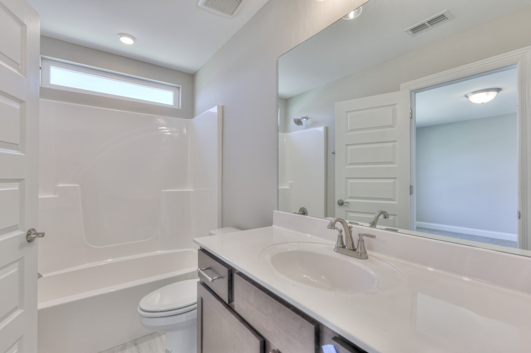 437 Ruby Oaks Lane Murfreesboro, TN 37128 - Photo 25 of 38 a bathroom with a granite countertop sink toilet and shower
