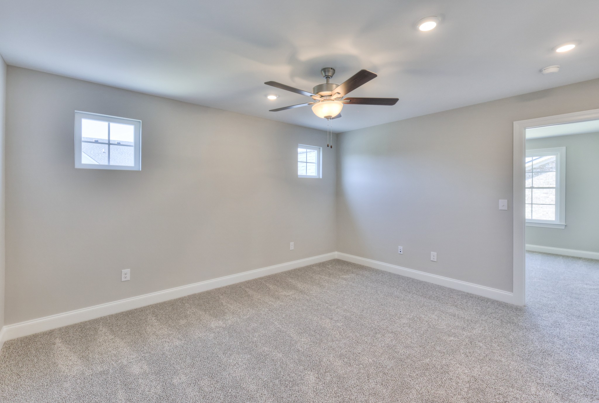 437 Ruby Oaks Lane Murfreesboro, TN 37128 - Photo 32 of 38 an empty room with a window and ceiling fan