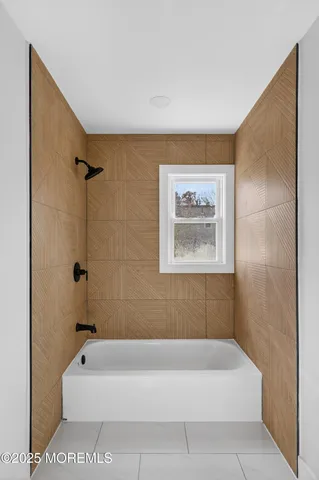 a view of a hallway with white walls