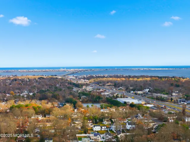 a picture of a bathroom with mirror